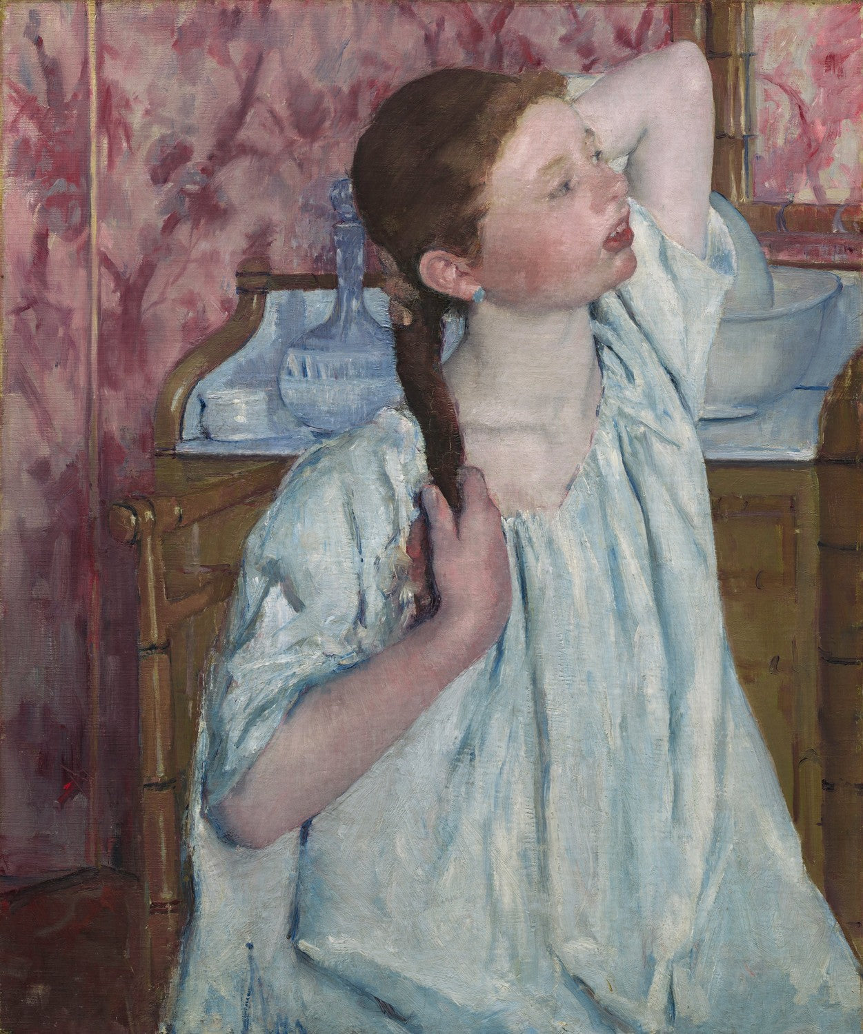 Girl Arranging Her Hair by Mary Cassatt