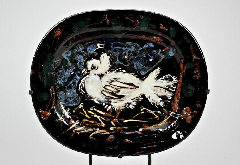 Dish with a dove