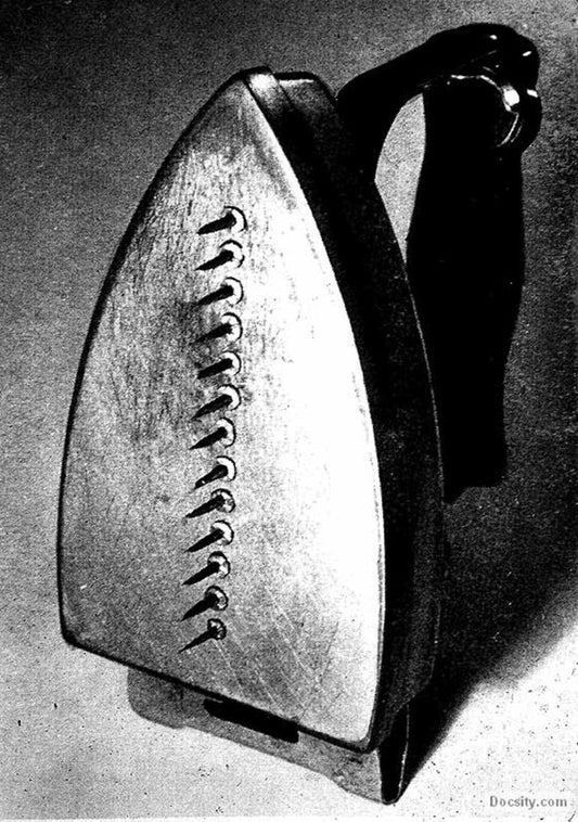 The Gift - by Man Ray