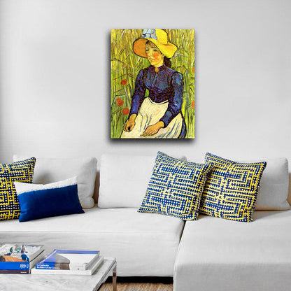 Young Peasant Girl in a Straw Hat sitting in front of a wheatfield - by Vincent van Gogh